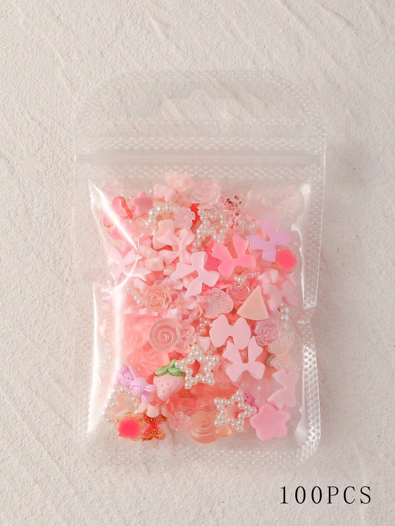 100 piezas 3D Mariposas de resina rosa, osos, flores de rosa, falda de durazno, lazo, ciervos, serpientes, conejos, animales en forma de arte de uñas, con estrás y perlas falsas para hacer decoración de arte de uñas y manualidades.