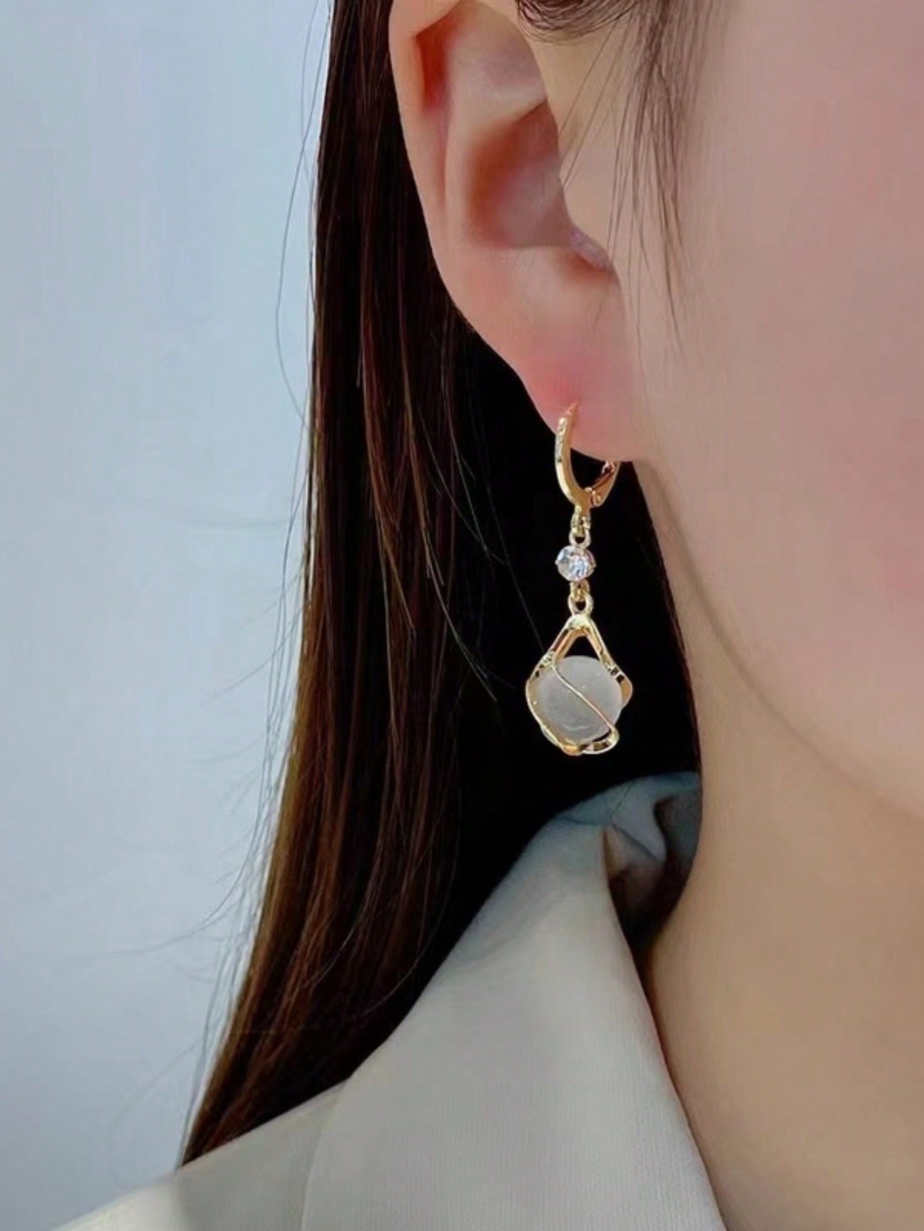 1 par de pendientes de moda clásicos europeos y americanos, pendientes de piedra de ojo de gato, pendientes largos con colgante de gota de diseño dulce