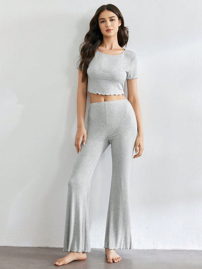 SHEIN Leisure Conjunto de pantalón negro y ropa de estar en casa con cintura acanalada y bajo ondulado cómodo