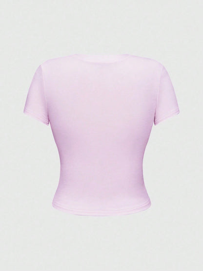 ROMWE Anime Camiseta ajustada de manga corta y cuello redondo con diseño de niña de dibujos animados para mujer