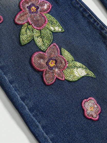 ROMWE Fairycore Jeans casuales versátiles de mezclilla con pierna campana y bolsillo con bordado floral para mujer