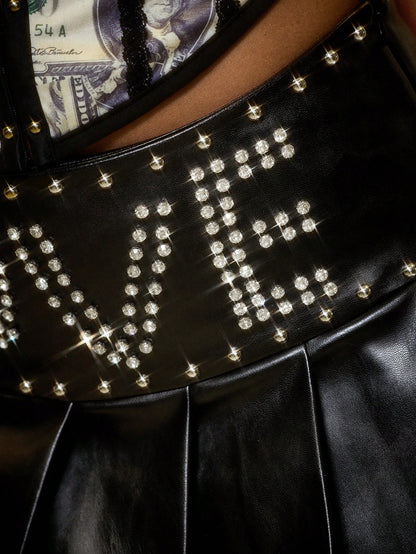 ROMWE Falda mini plisada con cintura ultrabaja y decoración de remaches en estilo punk Y2K (con mallas)