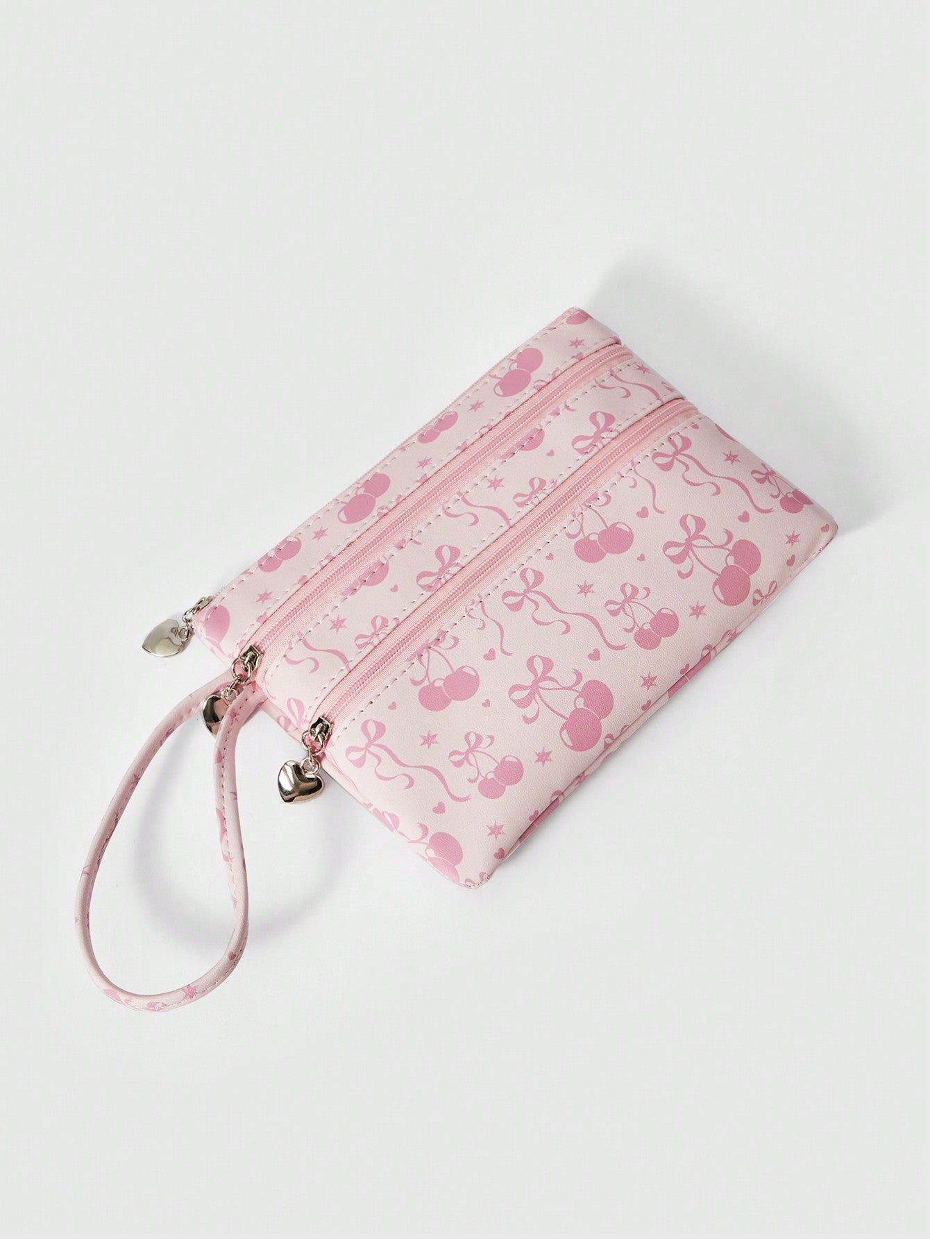 ROMWE Kawaii Bolsa con cremallera de gran capacidad con estampado de lazos de dibujos animados en toda la superficie