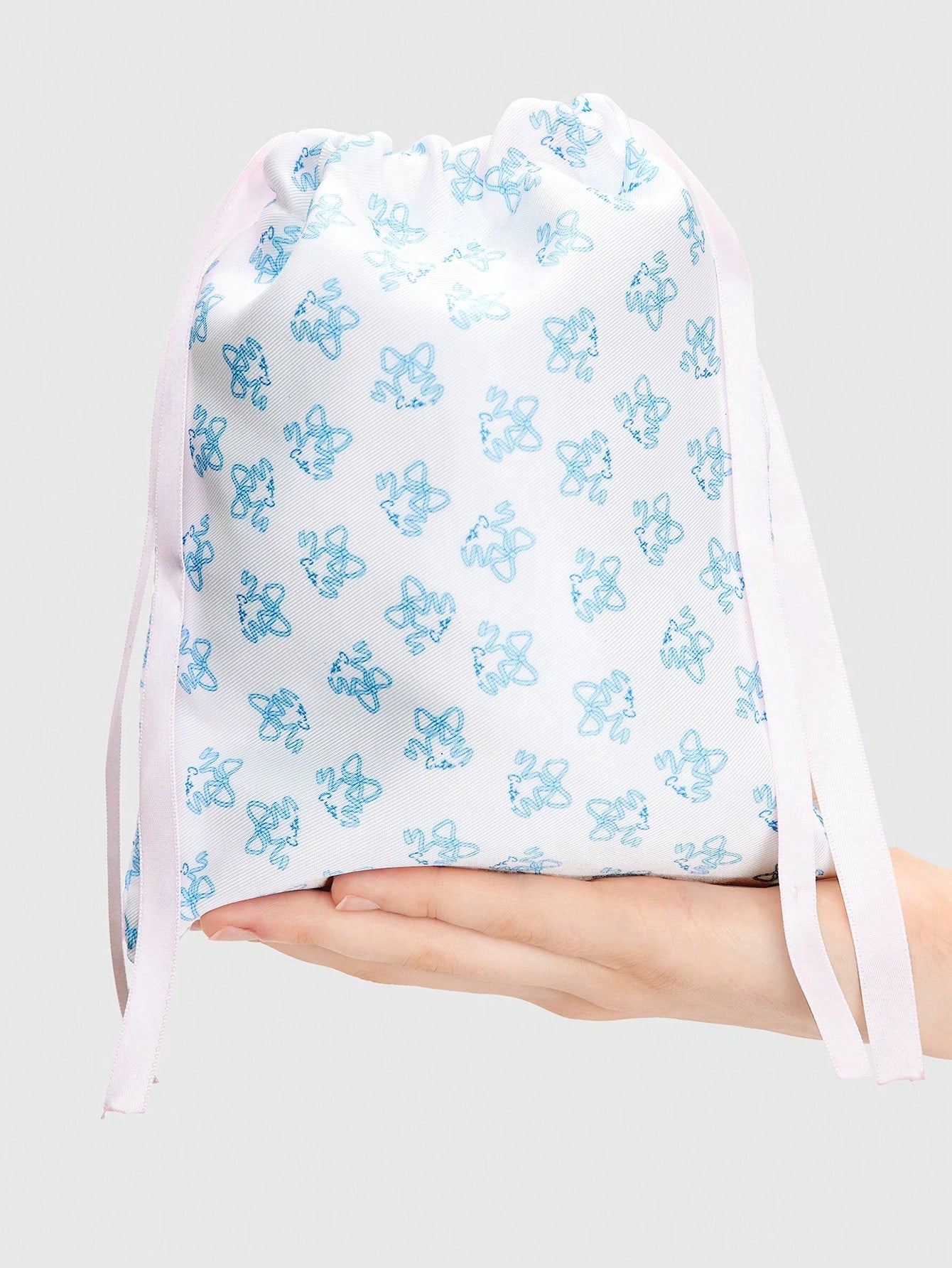 ROMWE Kawaii Bolsa de cosméticos portátil con cordón de lazo y estampado completo de moños, bolsa de almacenamiento