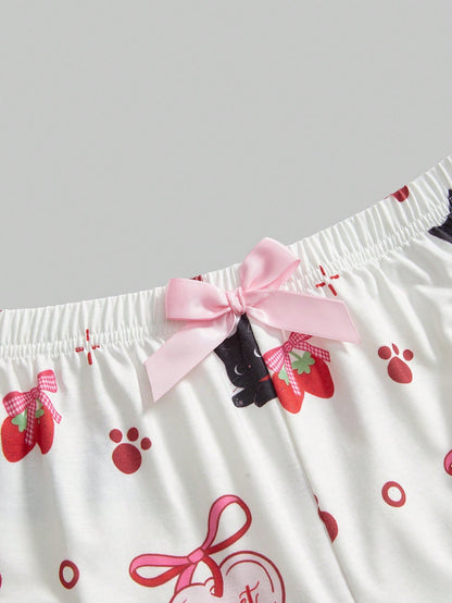 ROMWE Kawaii Conjunto de pijama casual de camiseta de tirantes y shorts con volantes, decoración de lazo y estampado de gatos kawaii para mujeres en verano