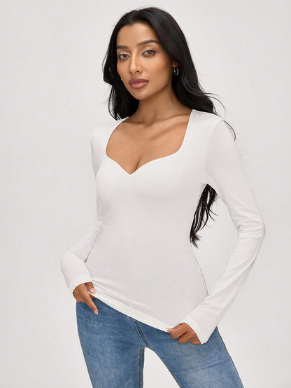 SHEIN BASICS Blusa ajustada de manga larga con escote de ojo de cerradura de unicolor de punto para mujeres