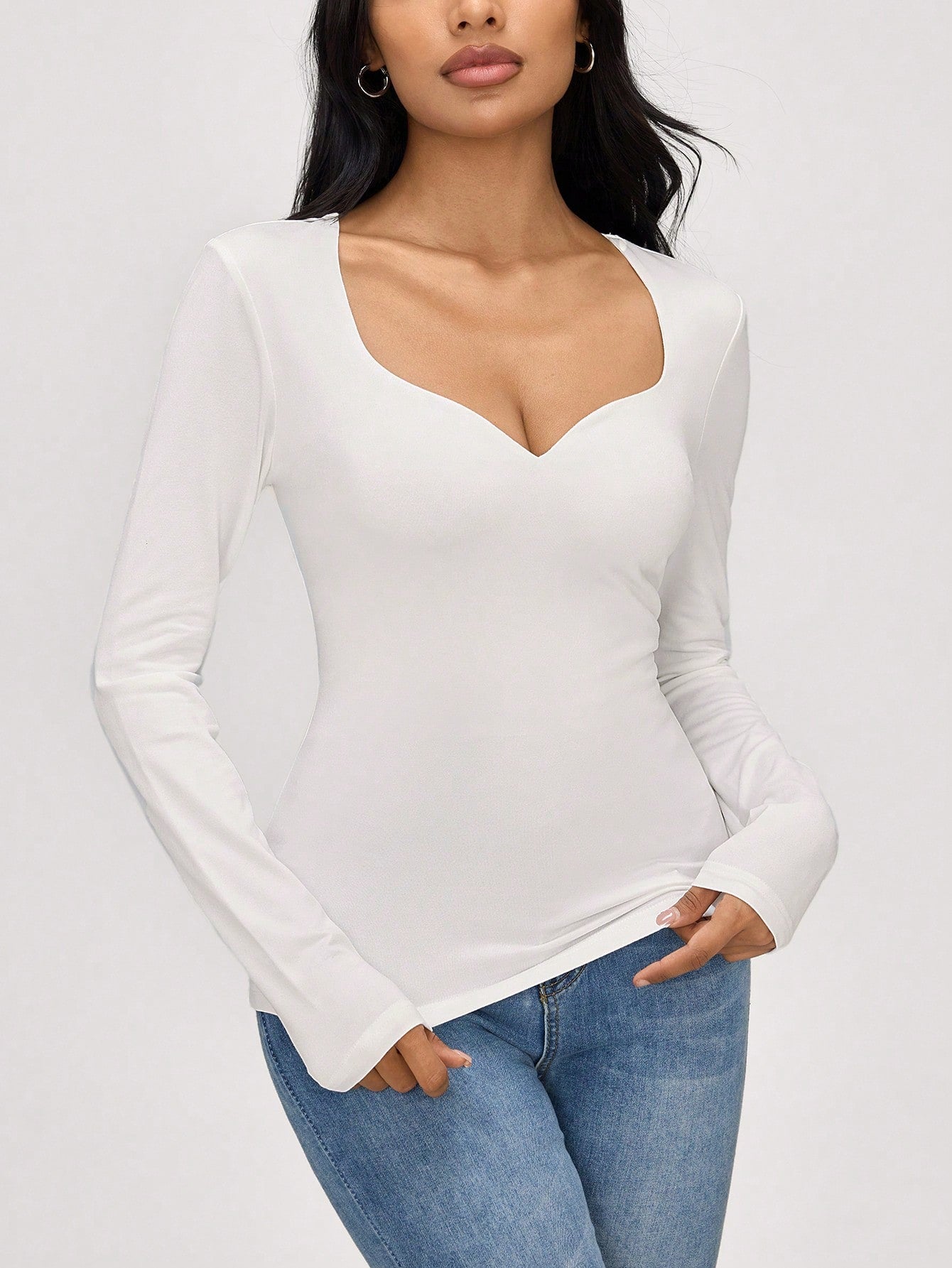 SHEIN BASICS Blusa ajustada de manga larga con escote de ojo de cerradura de unicolor de punto para mujeres