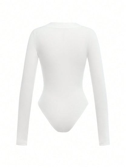 SHEIN BASICS Body de una sola tonalidad de punto con cuello redondo y manga larga para mujeres, de corte delgado y casual