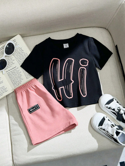 SHEIN Conjunto informal para niña preadolescente con camiseta de cuello redondo y mangas cortas impresa y shorts