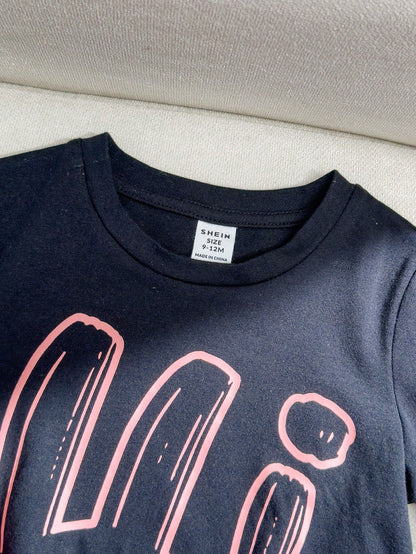 SHEIN Conjunto informal para niña preadolescente con camiseta de cuello redondo y mangas cortas impresa y shorts