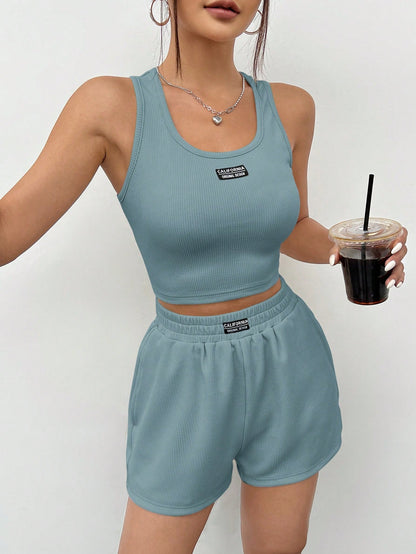 SHEIN EZwear Conjunto de top sin mangas y shorts de punto en tono azul neblina para mujeres