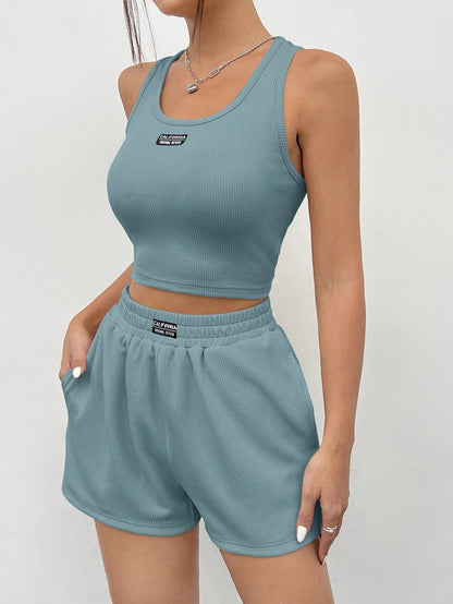 SHEIN EZwear Conjunto de top sin mangas y shorts de punto en tono azul neblina para mujeres