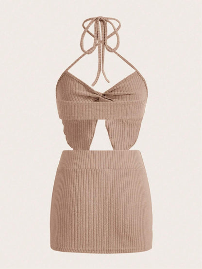 SHEIN ICON Conjunto De Falda Y Chaleco Con Cuello Halter Y Dobladillo Dividido Para Mujer