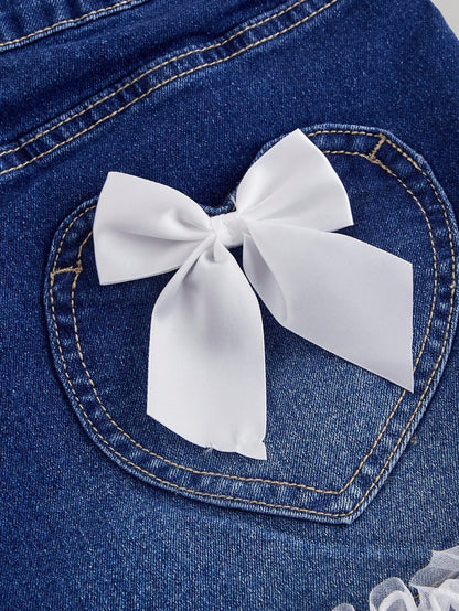 SHEIN MOD Pantalones cortos de mezclilla con volantes en el bajo, decoración de moño y múltiples bolsillos con botones delanteros para mujeres