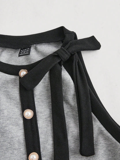 SHEIN MOD Top sin mangas de cuello redondo para mujer con decoración de botones y lazo en blanco y negro, estilo patchwork, perfecto para una cita nocturna