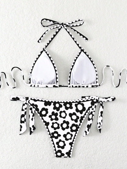 SHEIN Swim Conjunto de bikini para mujer, parte superior con escote halter y espalda descubierta, Bottom anudada a los lados con estampado floral para playa de verano