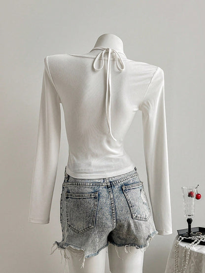 SHEIN Unity Camiseta ajustada de manga larga con cuello en V, parches de encaje y punto acanalado negro. Elegante y vintage, ideal para ir a trabajar, casual, citas, primavera/otoño