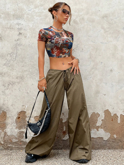 SHEIN X Doris Jocelyn SHEIN ICON Top con estampado de figura crop de malla