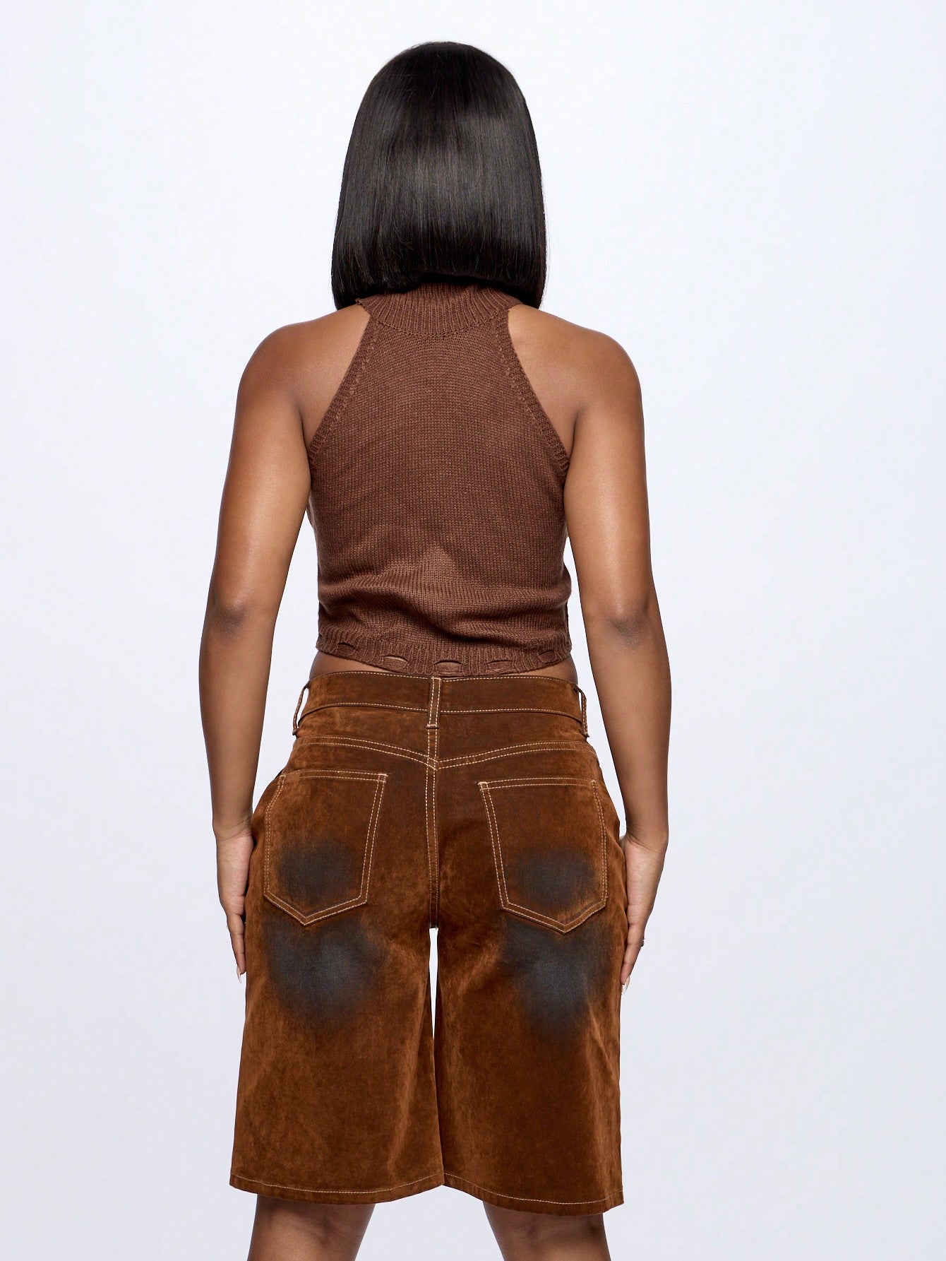 SUMWON WOMEN Top corto de cuello alto acanalado sin mangas con detalle de dobladillo texturizado, esencial de moda versátil de punto para otoño e invierno
