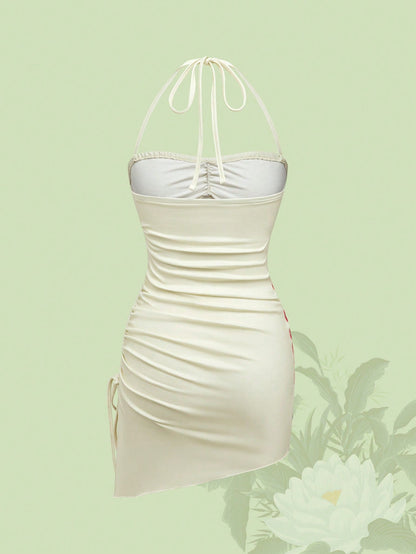 The White Lotus Vestido de cuello halter con plisado y nudo lateral con estampado de flores