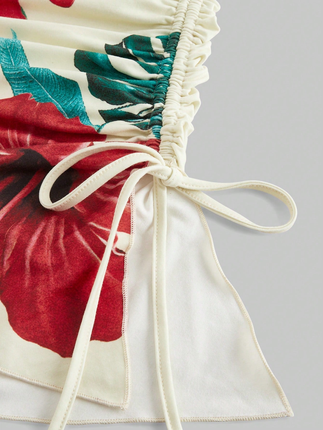 The White Lotus Vestido de cuello halter con plisado y nudo lateral con estampado de flores